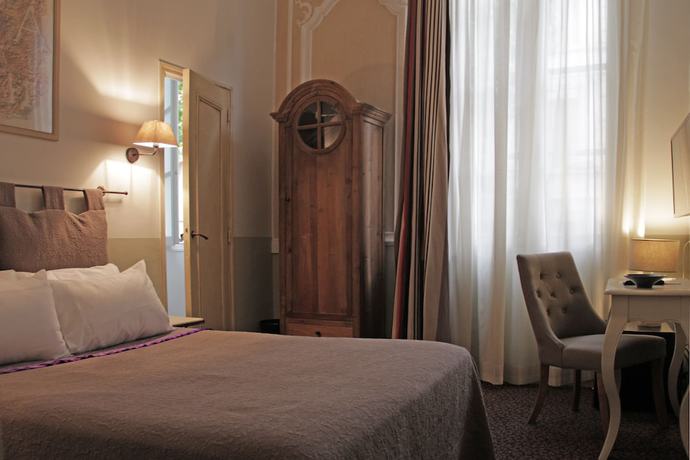 Imagen de la habitación del Hotel H&ocirc;tel de l\'Amphith&eacute;&acirc;tre. Foto 8