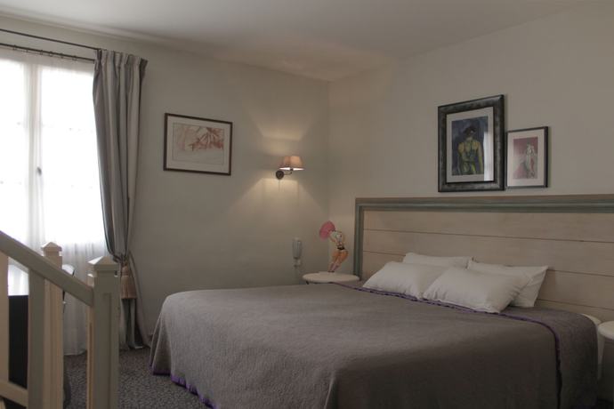 Imagen de la habitación del Hotel H&ocirc;tel de l\'Amphith&eacute;&acirc;tre. Foto 9
