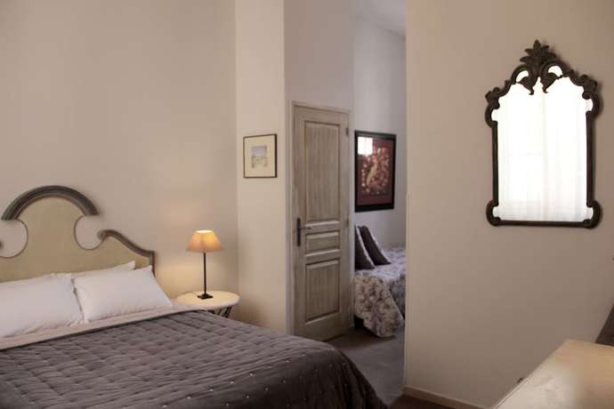 Imagen de la habitación del Hotel H&ocirc;tel de l\'Amphith&eacute;&acirc;tre. Foto 12