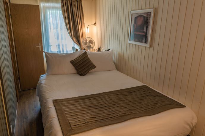 Imagen de la habitación del Hotel H&ocirc;tel de l\'Ange. Foto 6