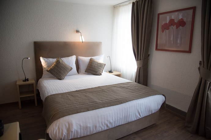 Imagen de la habitación del Hotel H&ocirc;tel de l\'Ange. Foto 8