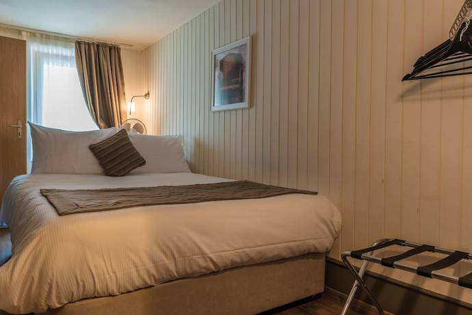 Imagen de la habitación del Hotel H&ocirc;tel de l\'Ange. Foto 10