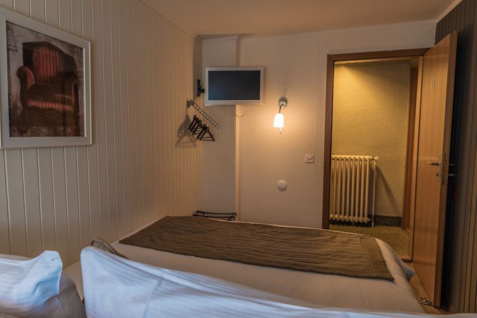 Imagen de la habitación del Hotel H&ocirc;tel de l\'Ange. Foto 13