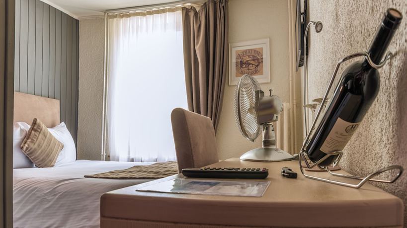 Imagen de la habitación del Hotel H&ocirc;tel de l\'Ange. Foto 17