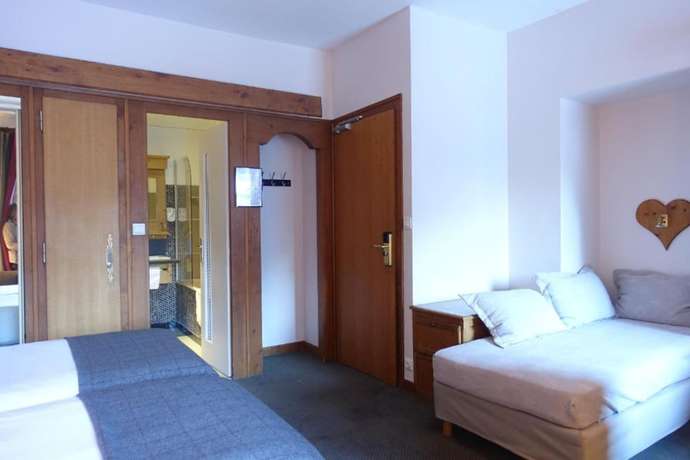 Imagen de la habitación del Hotel Hôtel de la Couronne. Foto 4