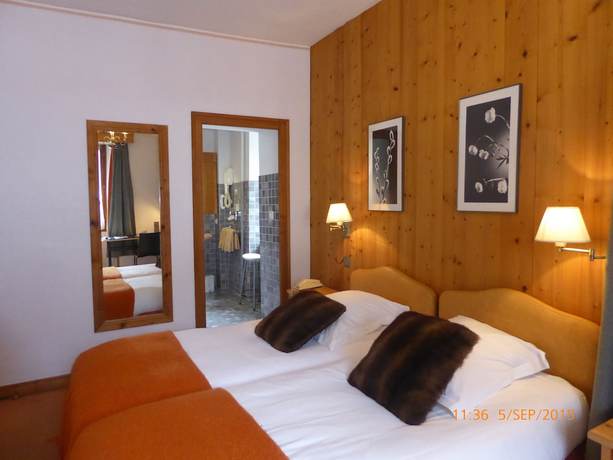 Imagen de la habitación del Hotel Hôtel de la Couronne. Foto 5