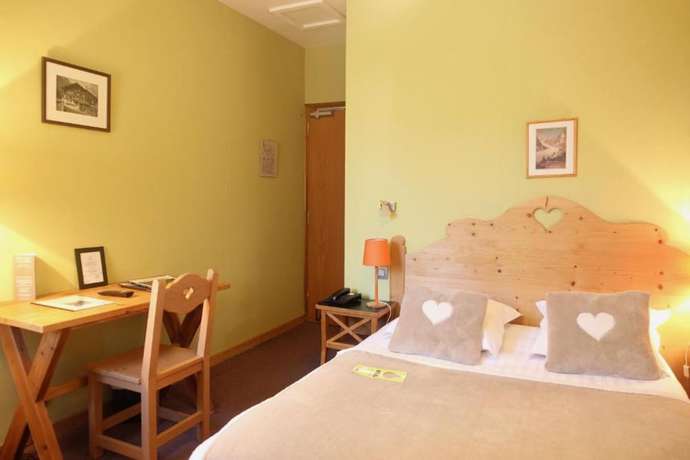 Imagen de la habitación del Hotel Hôtel de la Couronne. Foto 10