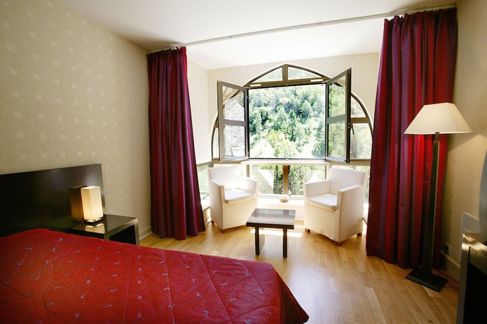 Imagen de la habitación del Hotel H&ocirc;tel de la Muse et du Rozier. Foto 11