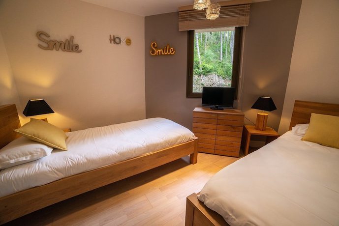 Imagen de la habitación del Hotel H&ocirc;tel de la Muse et du Rozier. Foto 12