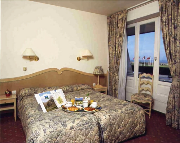 Imagen de la habitación del Hotel H&ocirc;tel de la Plage, Courseulles-sur-Mer. Foto 14