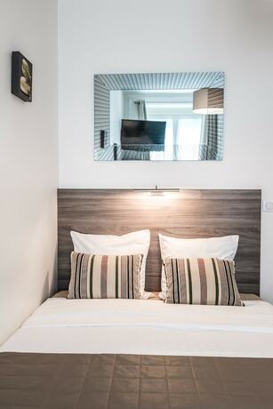 Imagen de la habitación del Hotel H&ocirc;tel de la T.A. Foto 17