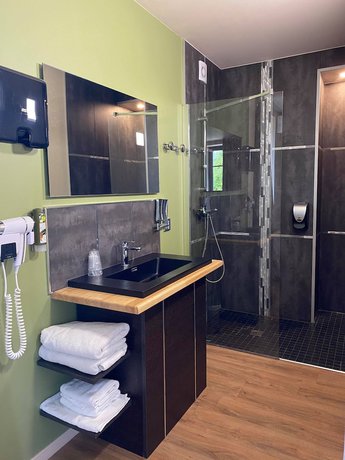 Imagen de la habitación del Hotel Hôtel de la Vinaigrerie. Foto 16