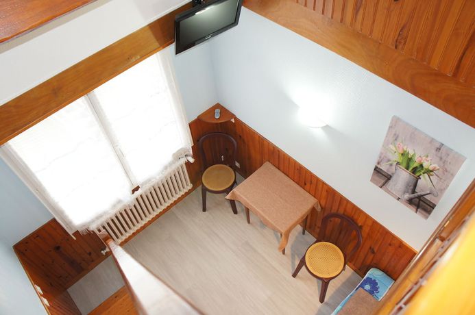 Imagen de la habitación del Hotel H&ocirc;tel de la place. Foto 7