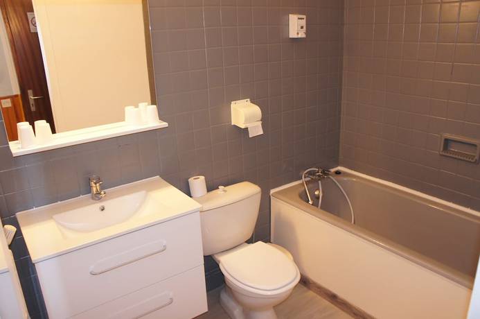 Imagen de la habitación del Hotel H&ocirc;tel de la place. Foto 10