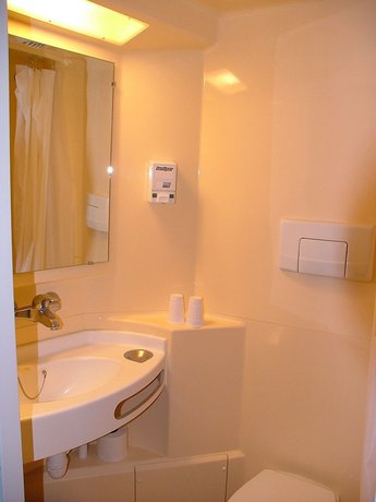 Imagen de la habitación del Hotel H&ocirc;tel de la place. Foto 12