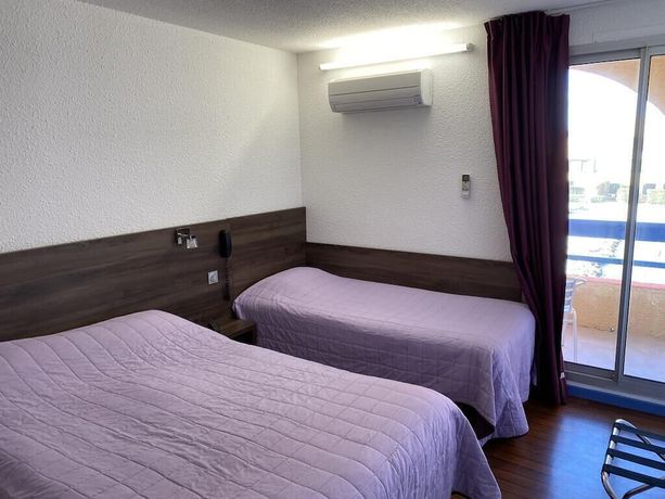 Imagen de la habitación del Hotel H&ocirc;tel des 2 golfs. Foto 10