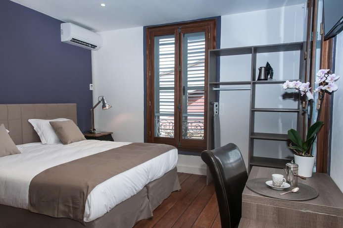 Imagen de la habitación del Hotel H&ocirc;tel des Palmistes. Foto 8