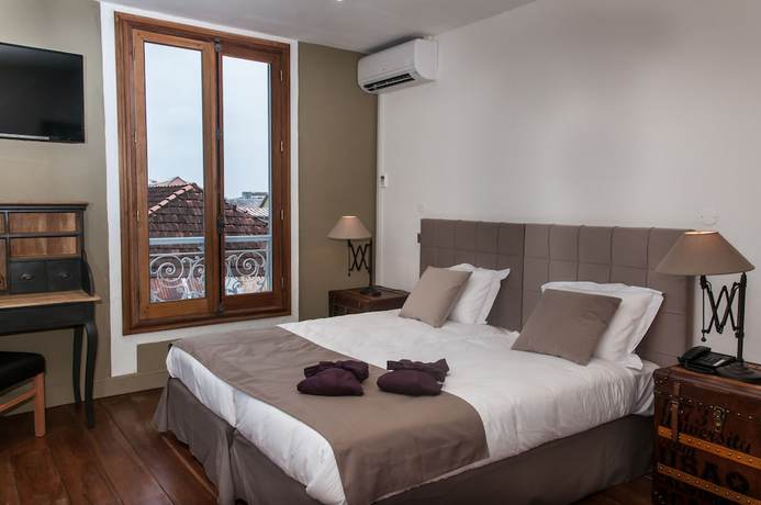 Imagen de la habitación del Hotel H&ocirc;tel des Palmistes. Foto 18
