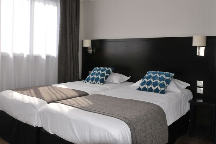 Imagen de la habitación del Hotel Hôtel des Quatrans. Foto 8