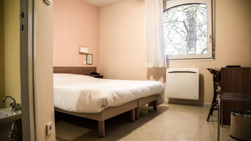 Imagen de la habitación del Hotel H&ocirc;tel du Canal. Foto 6