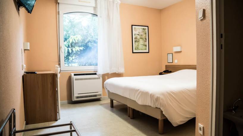 Imagen de la habitación del Hotel H&ocirc;tel du Canal. Foto 7