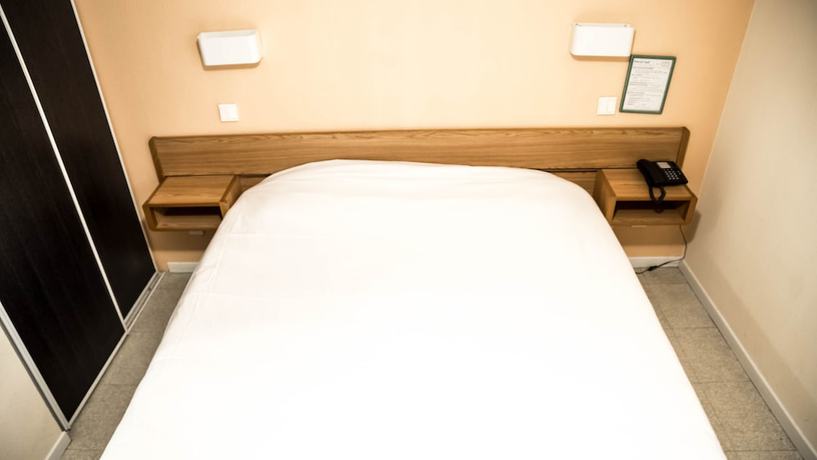 Imagen de la habitación del Hotel H&ocirc;tel du Canal. Foto 11