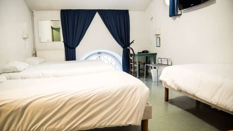 Imagen de la habitación del Hotel H&ocirc;tel du Canal. Foto 18