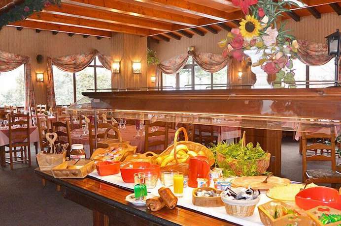 Imagen del bar/restaurante del Hotel Hôtel du Centre, La Borgé. Foto 3