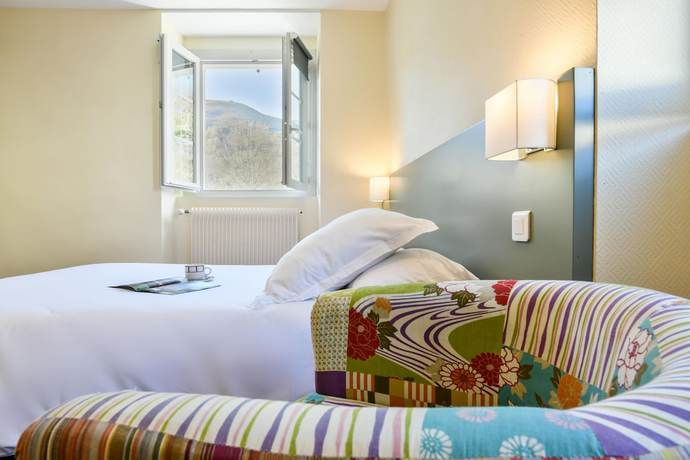 Imagen de la habitación del Hotel H&ocirc;tel du Ch&ecirc;ne. Foto 2