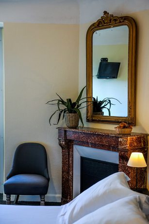 Imagen de la habitación del Hotel H&ocirc;tel du Ch&ecirc;ne. Foto 3
