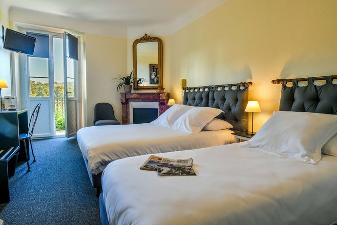 Imagen de la habitación del Hotel H&ocirc;tel du Ch&ecirc;ne. Foto 7