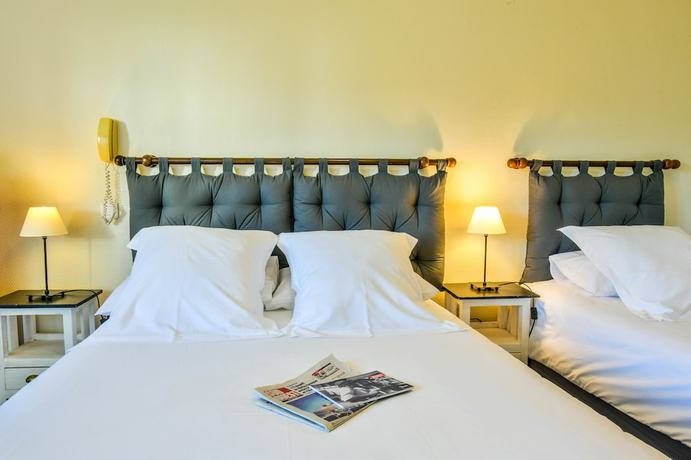 Imagen de la habitación del Hotel H&ocirc;tel du Ch&ecirc;ne. Foto 9