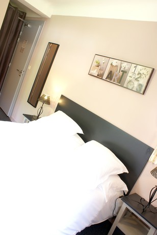 Imagen de la habitación del Hotel H&ocirc;tel du Ch&ecirc;ne. Foto 15