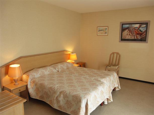 Imagen de la habitación del Hotel H&ocirc;tel du Commerce, Tronget. Foto 3
