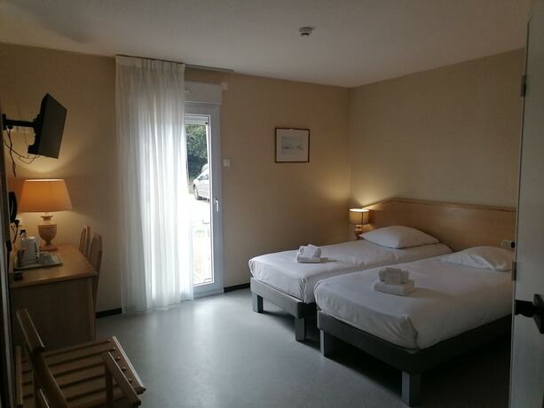 Imagen de la habitación del Hotel Hôtel du Commerce, Tronget. Foto 19