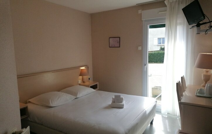 Imagen de la habitación del Hotel Hôtel du Commerce, Tronget. Foto 20