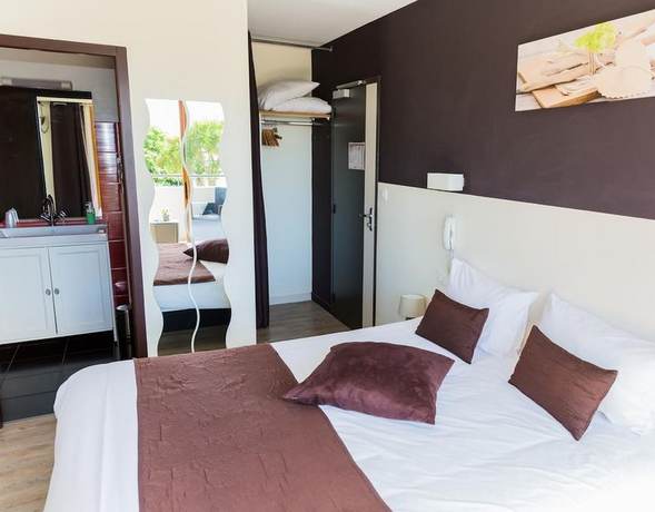 Imagen de la habitación del Hotel Hôtel du Large, PLOUGONVELIN. Foto 17