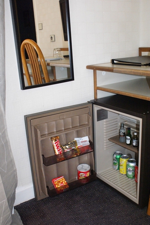 Imagen de la habitación del Hotel Hôtel du Maine, París. Foto 8