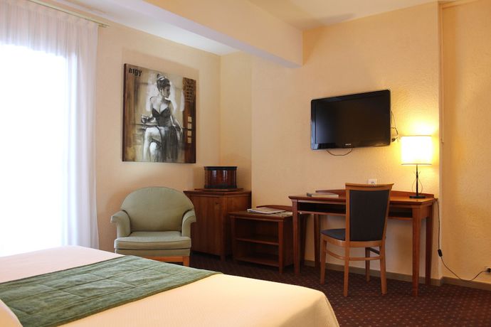 Imagen de la habitación del Hotel Hôtel du Parc, Cavalaire-sur-Mer. Foto 3