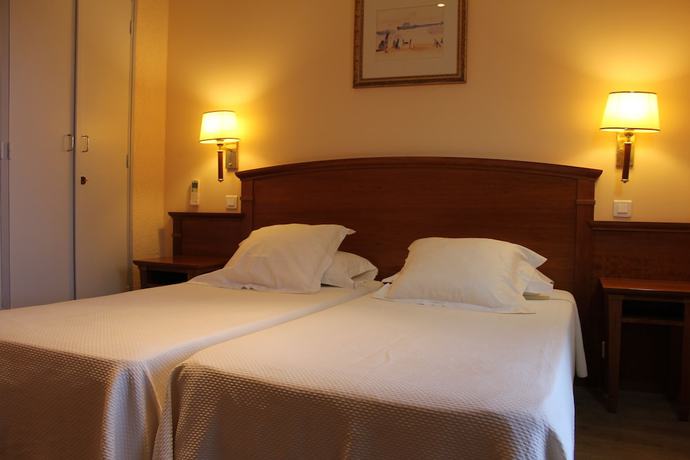 Imagen de la habitación del Hotel Hôtel du Parc, Cavalaire-sur-Mer. Foto 9