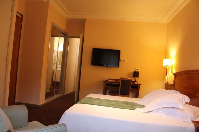 Imagen de la habitación del Hotel Hôtel du Parc, Cavalaire-sur-Mer. Foto 10