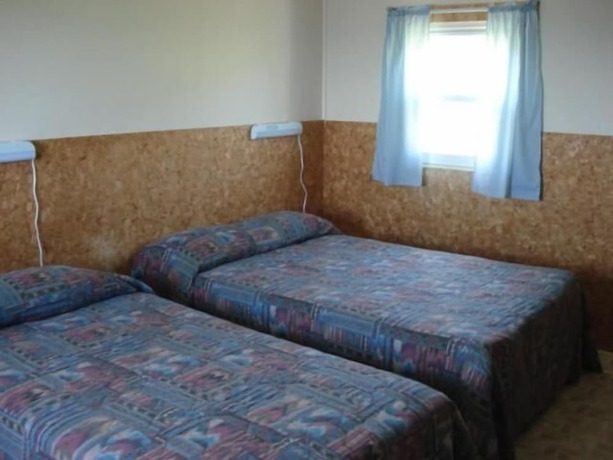 Imagen de la habitación del Hotel H&ocirc;tel du Rocher, Sainte-Madeleine-de-la-Rivi&egrave;re-Madeleine. Foto 2