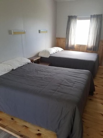 Imagen de la habitación del Hotel H&ocirc;tel du Rocher, Sainte-Madeleine-de-la-Rivi&egrave;re-Madeleine. Foto 6