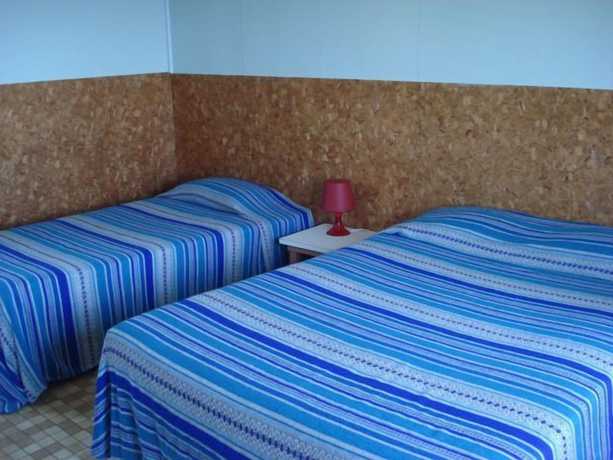 Imagen de la habitación del Hotel H&ocirc;tel du Rocher, Sainte-Madeleine-de-la-Rivi&egrave;re-Madeleine. Foto 9