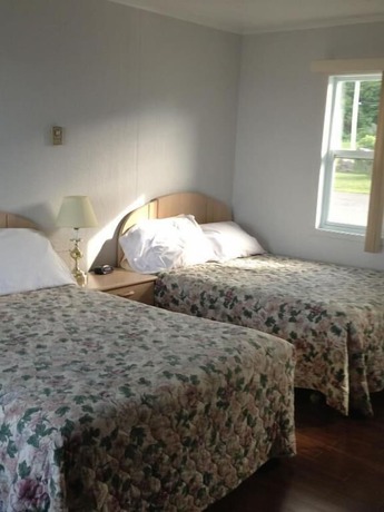 Imagen de la habitación del Hotel H&ocirc;tel du Rocher, Sainte-Madeleine-de-la-Rivi&egrave;re-Madeleine. Foto 10