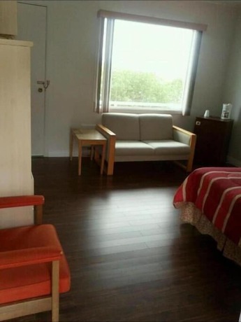 Imagen de la habitación del Hotel H&ocirc;tel du Rocher, Sainte-Madeleine-de-la-Rivi&egrave;re-Madeleine. Foto 18