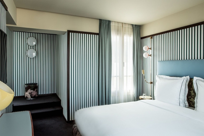 Imagen de la habitación del Hotel Hôtel du Rond-Point des Champs-Élysées. Foto 2