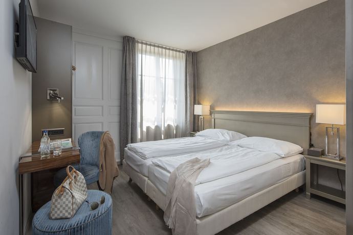 Imagen de la habitación del Hotel H&ocirc;tel du Th&eacute;&acirc;tre. Foto 7