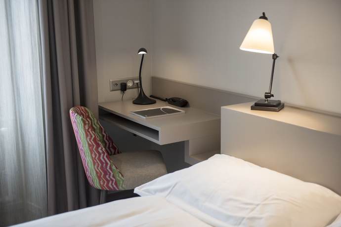 Imagen de la habitación del Hotel H&ocirc;tel du Th&eacute;&acirc;tre. Foto 8