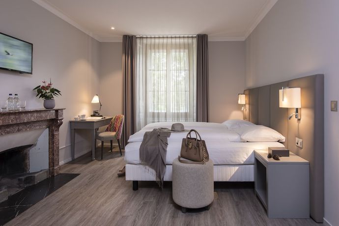 Imagen de la habitación del Hotel H&ocirc;tel du Th&eacute;&acirc;tre. Foto 10